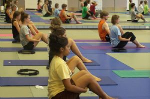 Teens in yoga class.